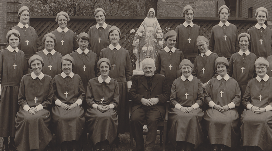Father George Daly with first Sisters