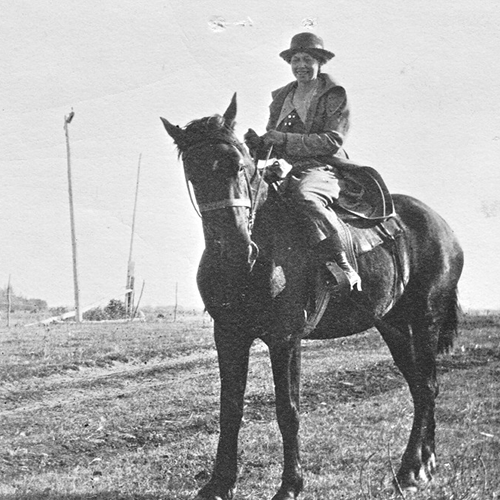 Catherine Donnelly on horseback in Saskatchewan