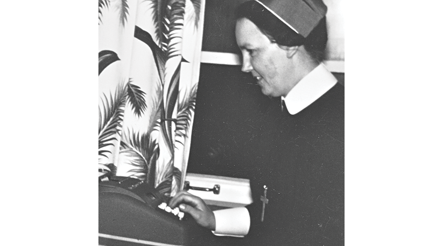 Sister Mary Reansbury and adding machine