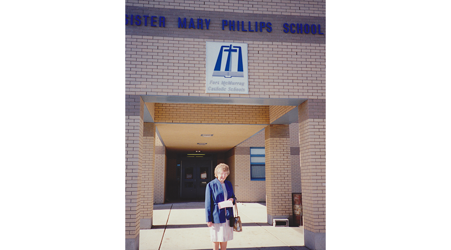 Sister Mary Phillips outside school named after her