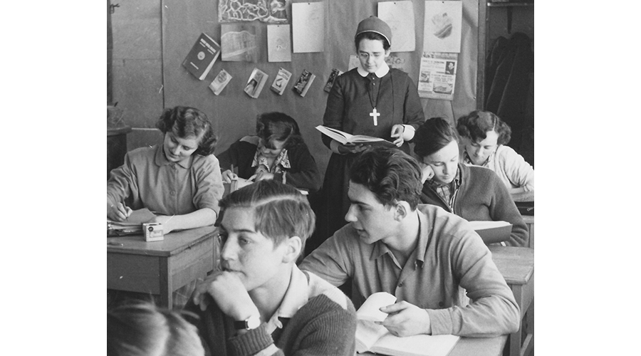 Sister Joan Coffey teaches students