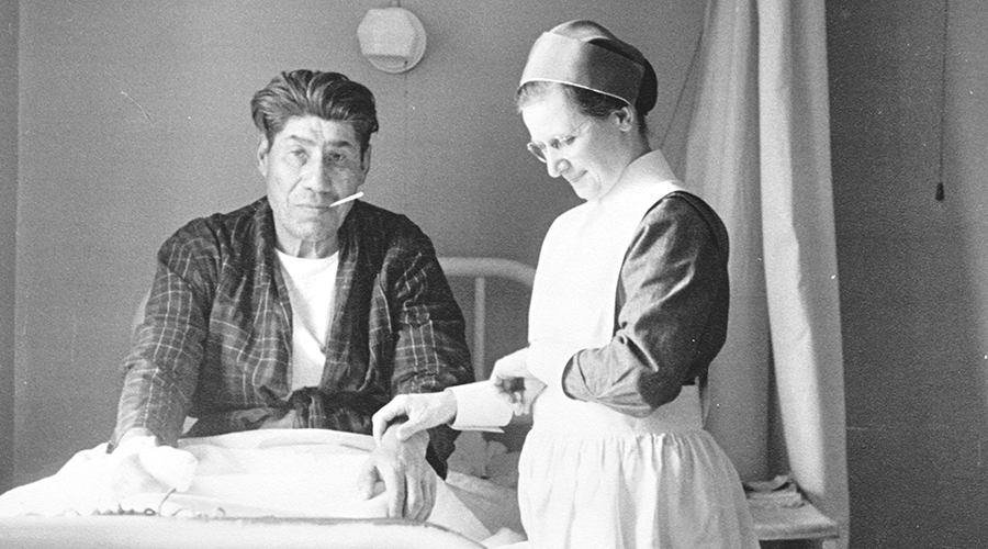Sister Martha Knechtel with a patient
