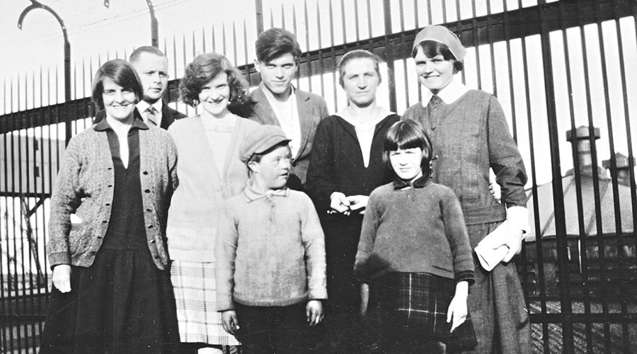 Sister Szostak with immigrants