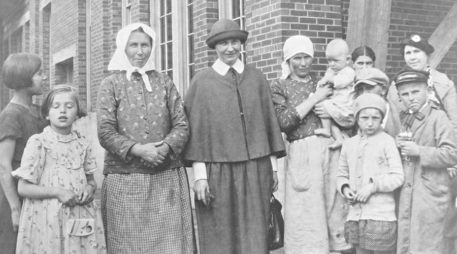 Sister Dulaska with immigrants