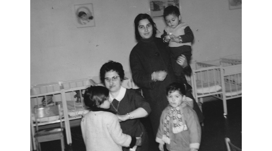 Sister Sally Liota with a family