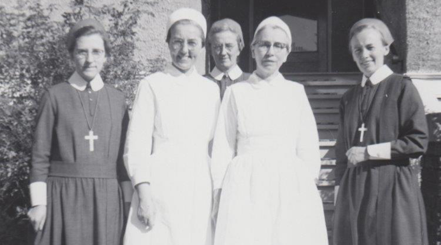 Sisters at hospital's entrance