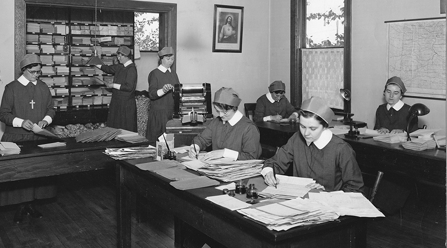Sisters work in the office of the Religious Correspondence School, Regina